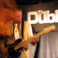 Ben Raine plays bass and looks a bit like Eric Clapton on a bad day